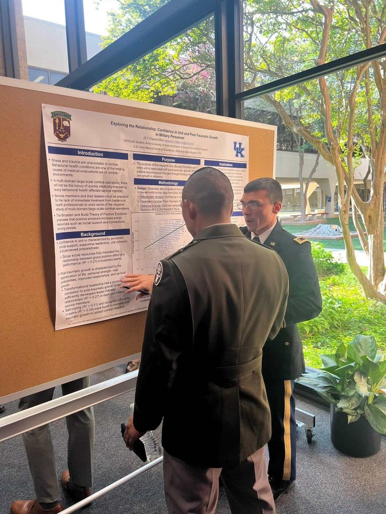 Chance Miller presenting on posterboard