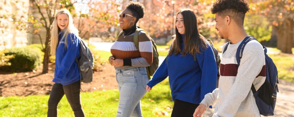 CoSW students walking and talking outside