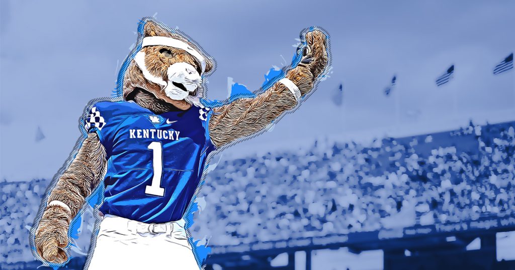 Scratch the Wildcat in a football uniform