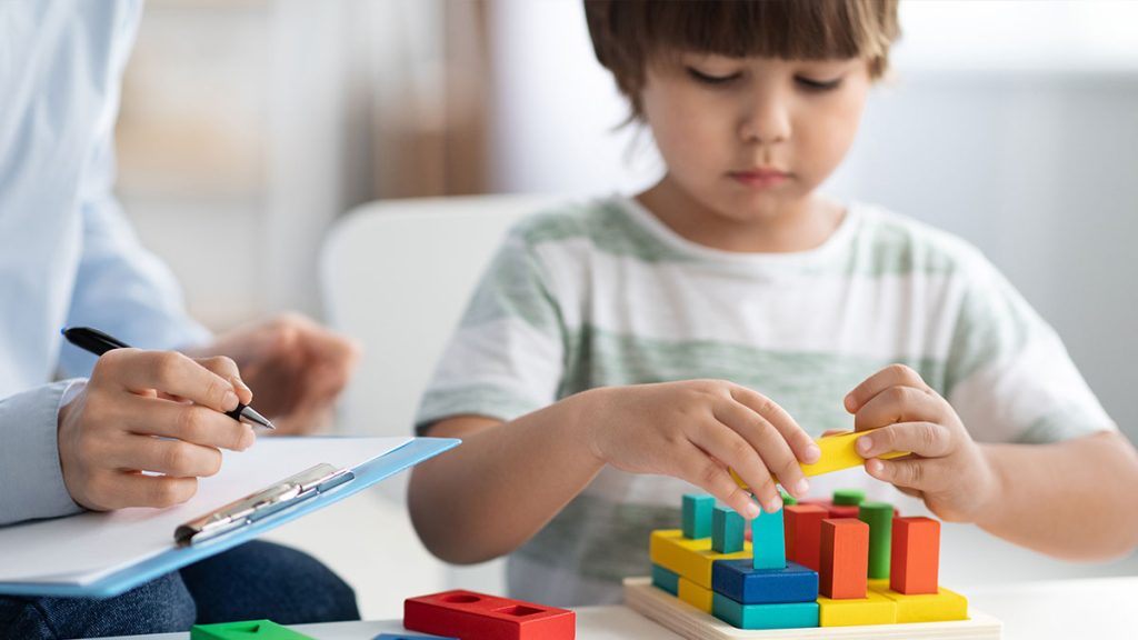 Child playing with toys