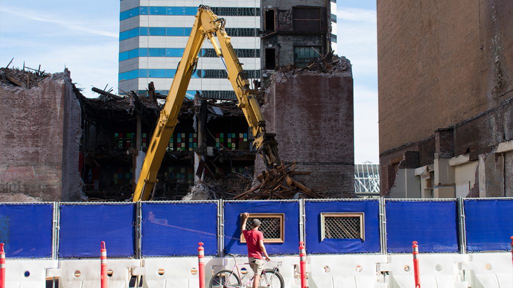 Man looking at a contstruction site