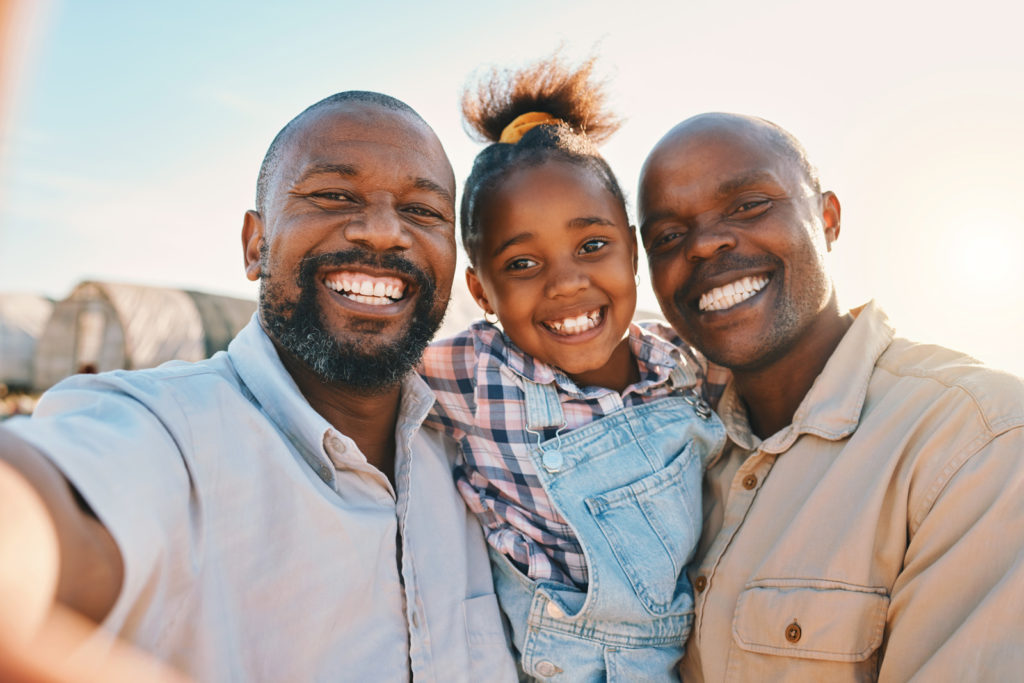 Two parents caring for child