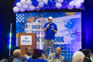 Dr. Matt Moore speaking on stage