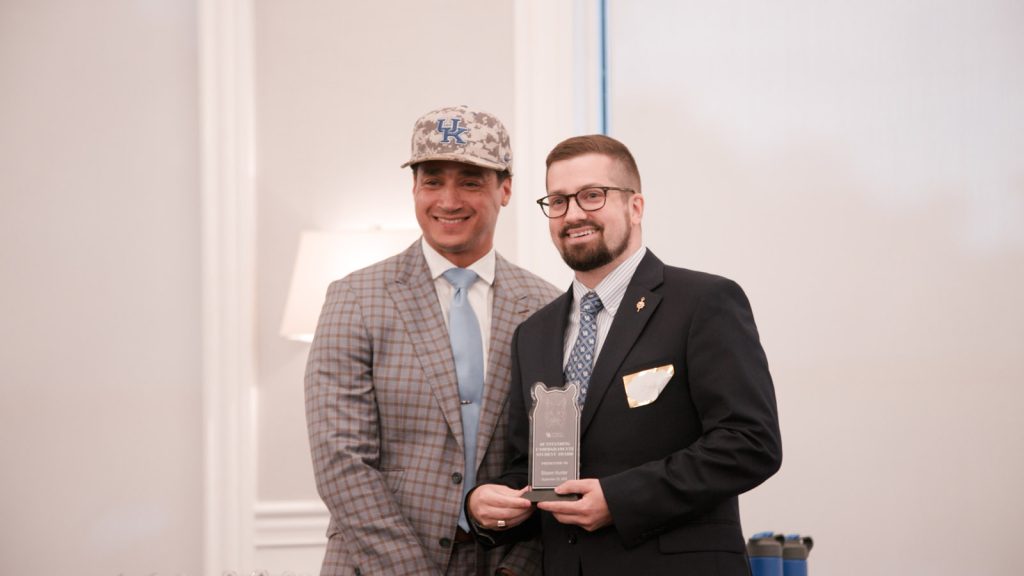 Dean Jay Miller and an award recipient at the 2025 CoSW Annual Recognition