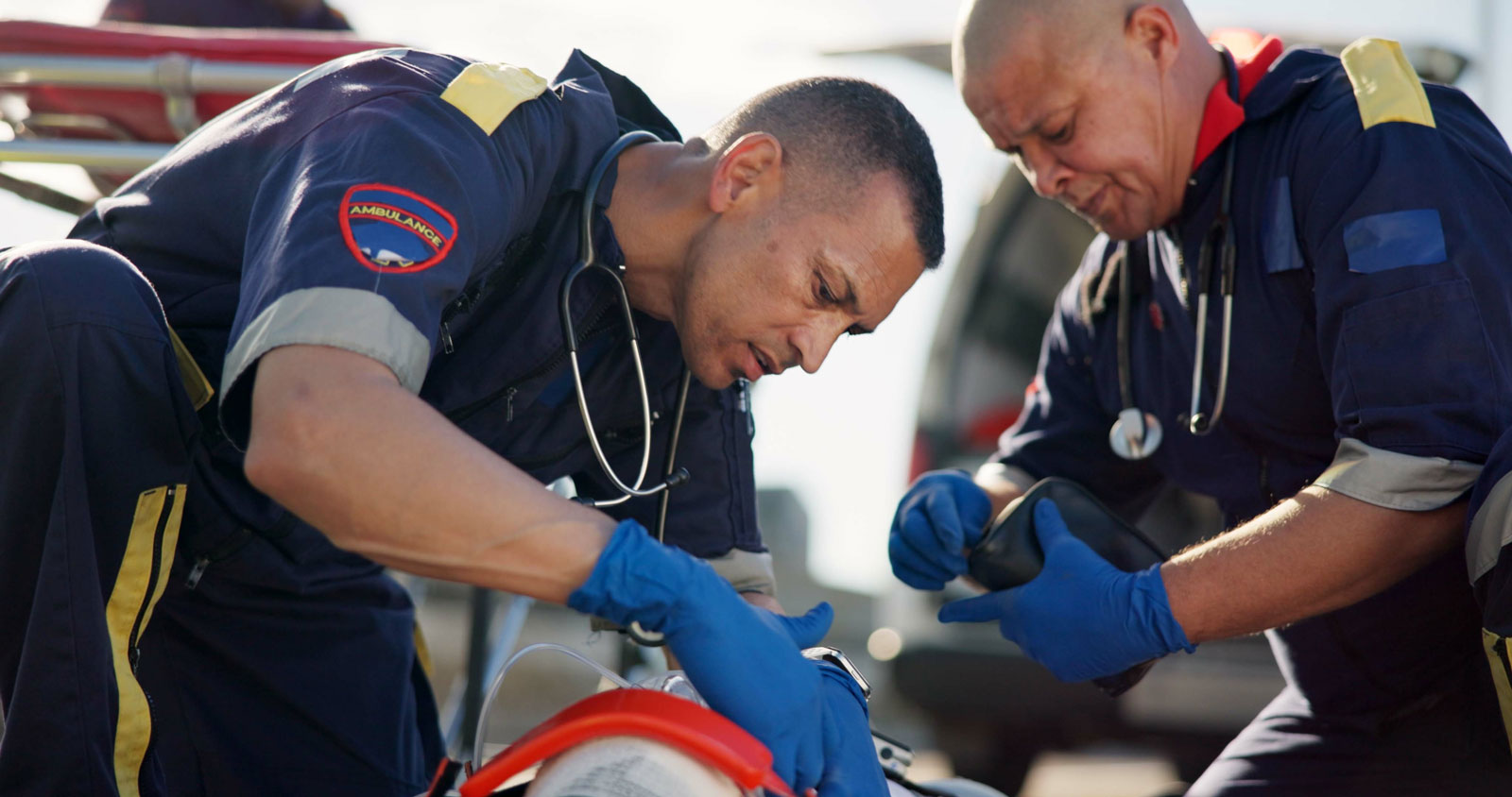 Emergency responders helping a person