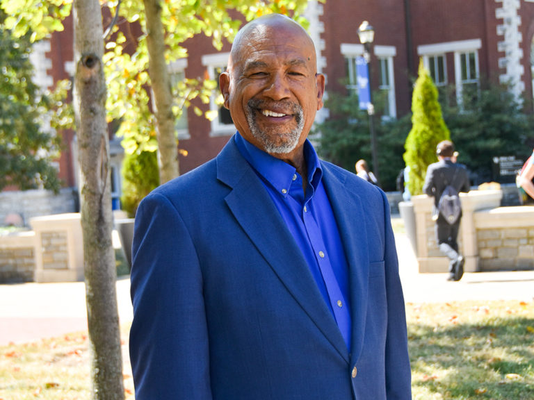 Willis Bright standing outside on the University of Kentucky campus