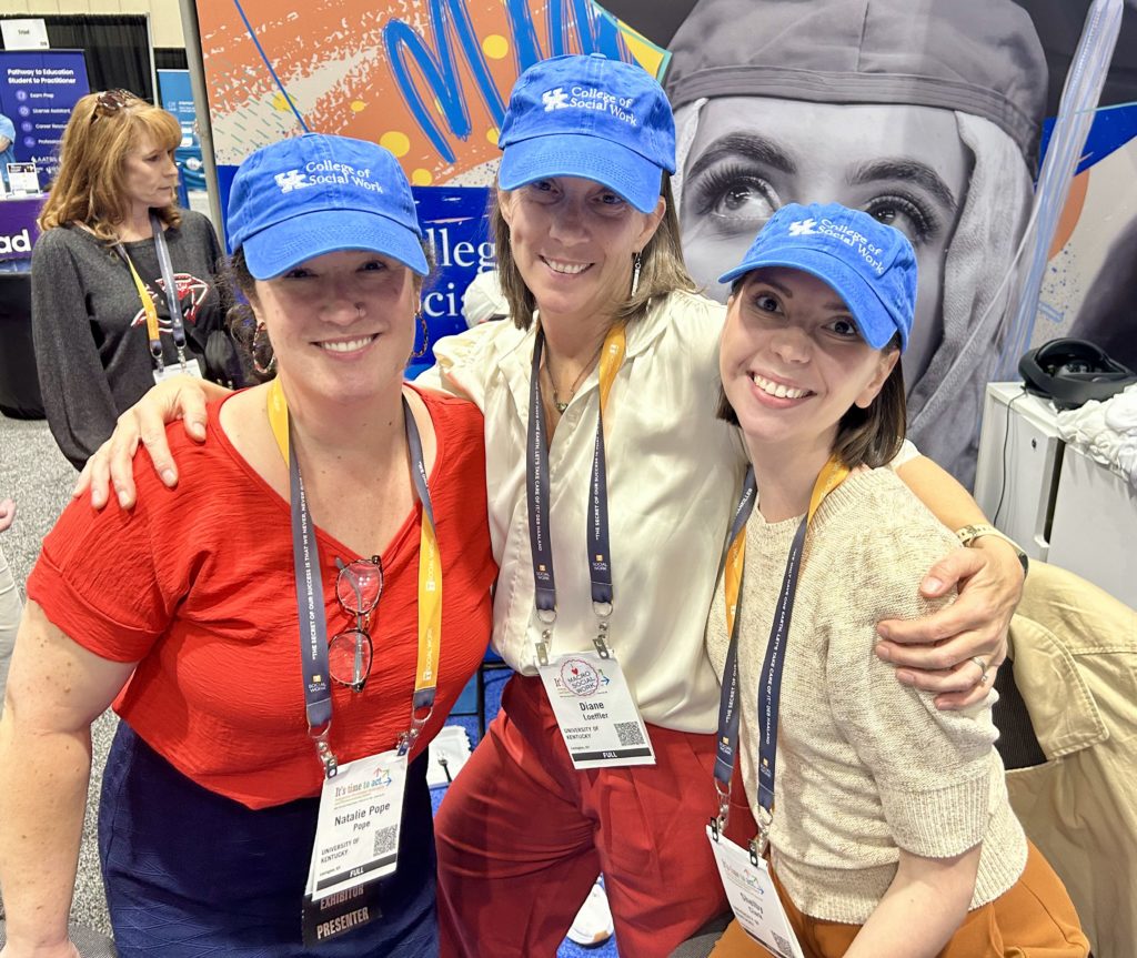Drs. Natalie Pope, Diane Loeffler and Shelby Clark posing at CSWE
