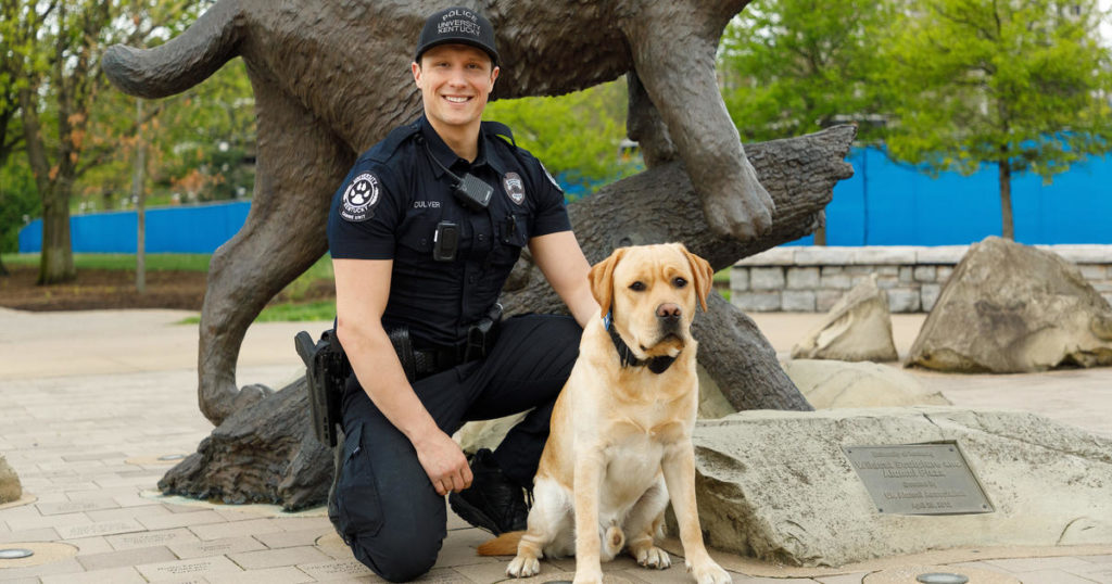 portrait of Officer Michael Culver and K9 Hudson