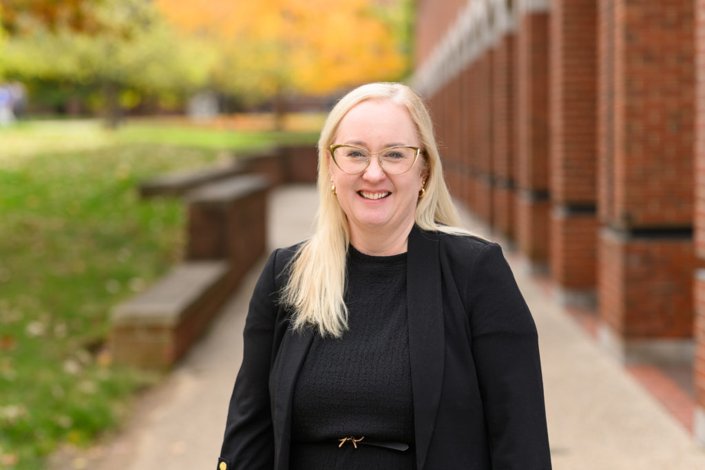 Headshot of Dr. Victoria Collins standing outside on UK's campus