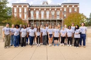 Image of Step-Up volunteers in front of UK Building
