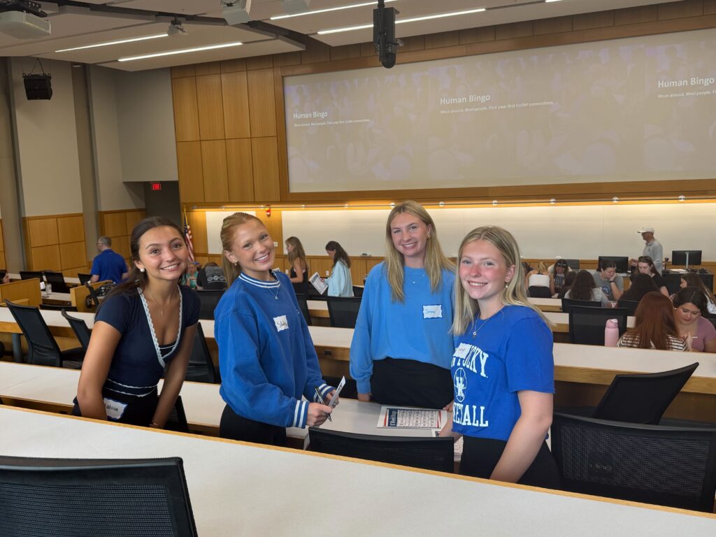 Four CoSW students smile together during K-Week Orientation