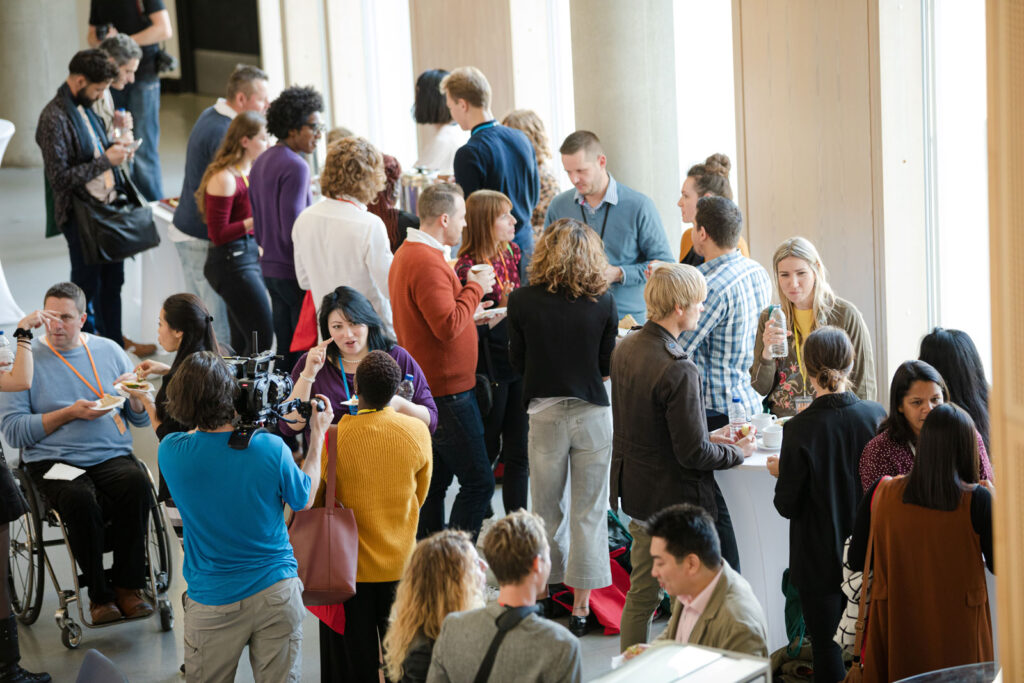 Group of people talking at a conference event
