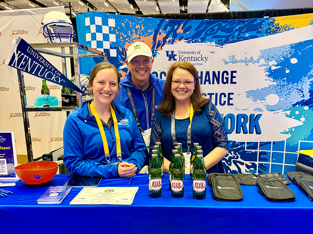 Sarah Cleaver, Dr. Matt Moore and Rebecca Meeks at the CoSW CSWE booth
